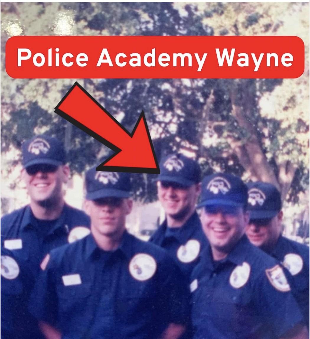 A young Wayne Partello in uniform with fellow graduates at the Polk County Florida Police Academy, labeled 'Police Academy Wayne' with an arrow pointing to him
